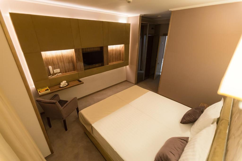 Katil atau katil-katil dalam bilik di Hotel Orient Braila