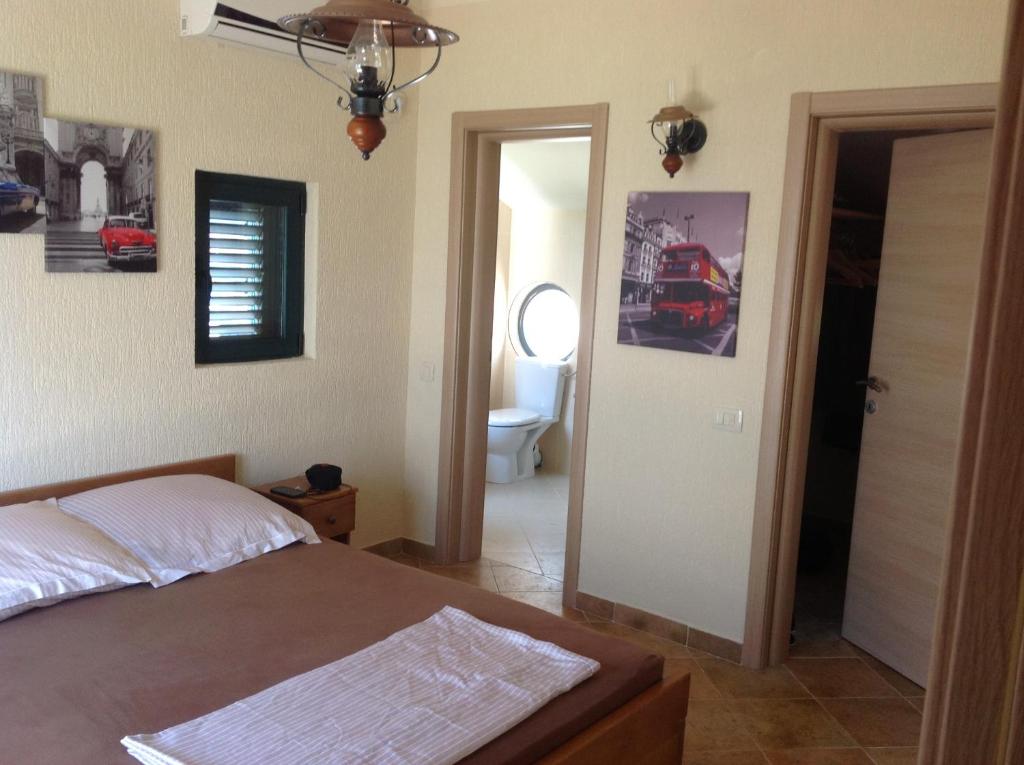 Postel nebo postele na pokoji v ubytování Villa "M Family"