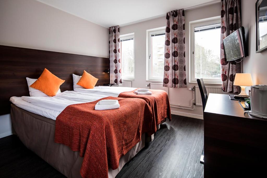 Postel nebo postele na pokoji v ubytování Best Western Hotel Solna