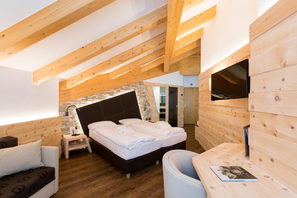 TV a/nebo společenská místnost v ubytování Wellness Hotel Lupo Bianco