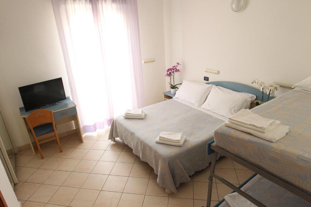 TV a/nebo společenská místnost v ubytování Hotel Giorg - WaterPark Included