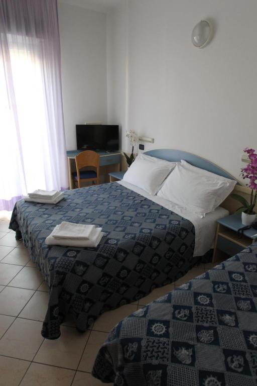 Postel nebo postele na pokoji v ubytování Hotel Giorg - WaterPark Included