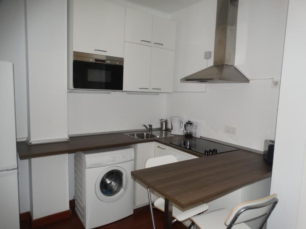 Kuchyňa alebo kuchynka v ubytovaní Málaga Apartamentos - Pozos Dulces, 22