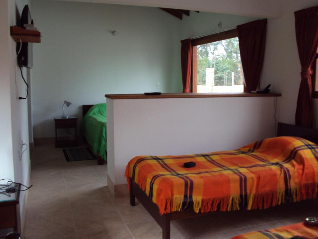 Postel nebo postele na pokoji v ubytování Casa Leo