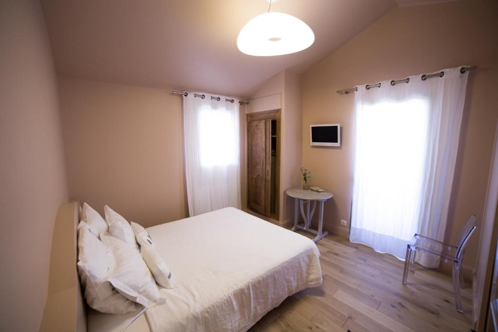 Postel nebo postele na pokoji v ubytování Chambre d'Hôtes Arima