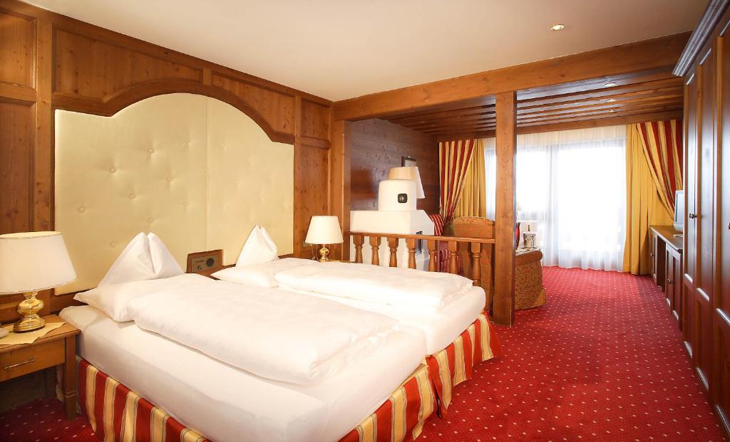 Postel nebo postele na pokoji v ubytování Hotel Edelweiss Hochsölden Superior