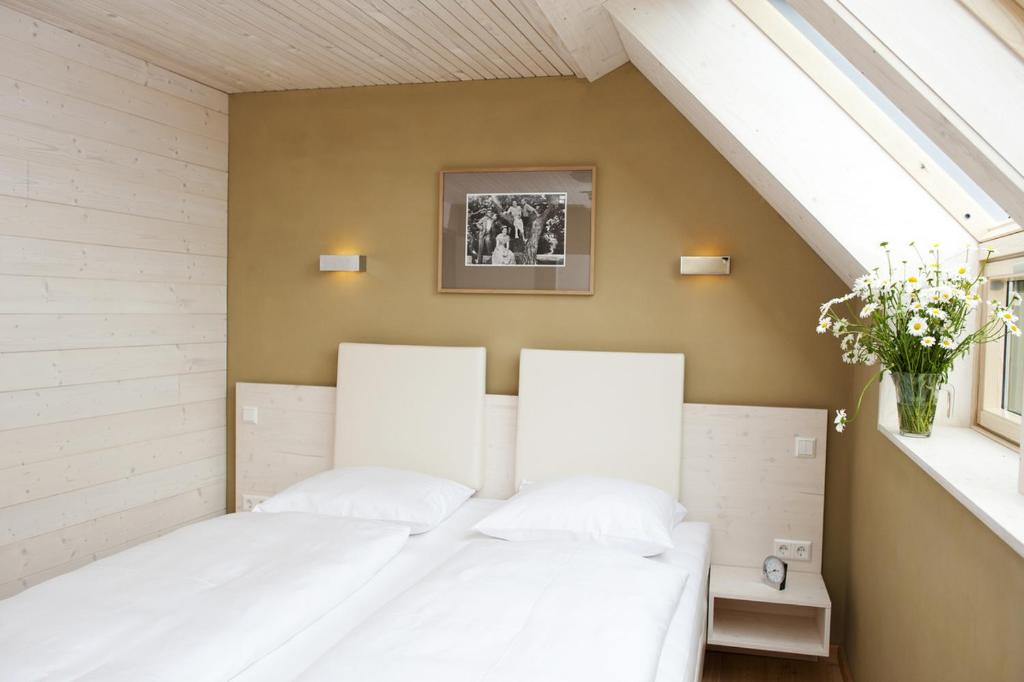 Postel nebo postele na pokoji v ubytování Familienhotel Weimar mit Ferienwohnungen