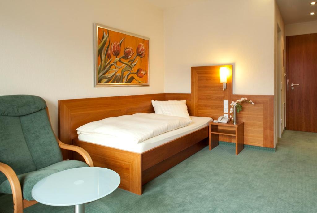 Postel nebo postele na pokoji v ubytování Hotel Adler