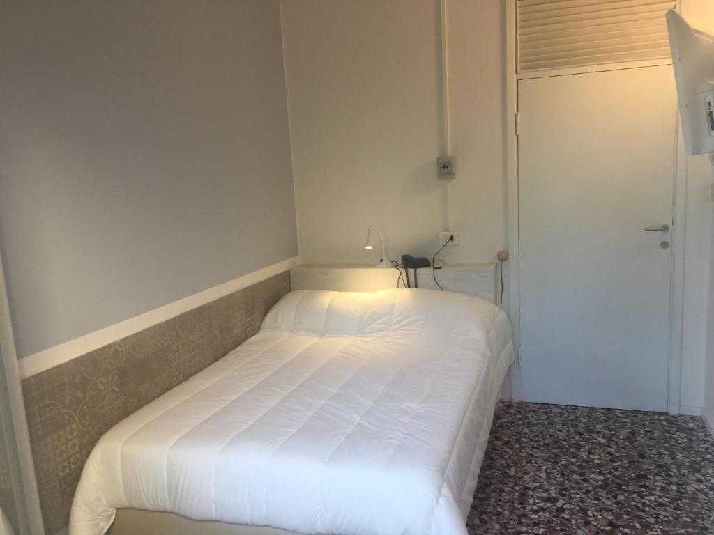 Postel nebo postele na pokoji v ubytování Hotel Costa Verde