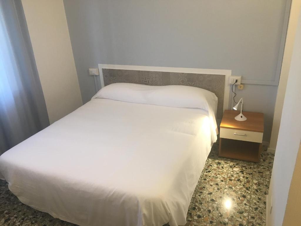 Postel nebo postele na pokoji v ubytování Hotel Costa Verde