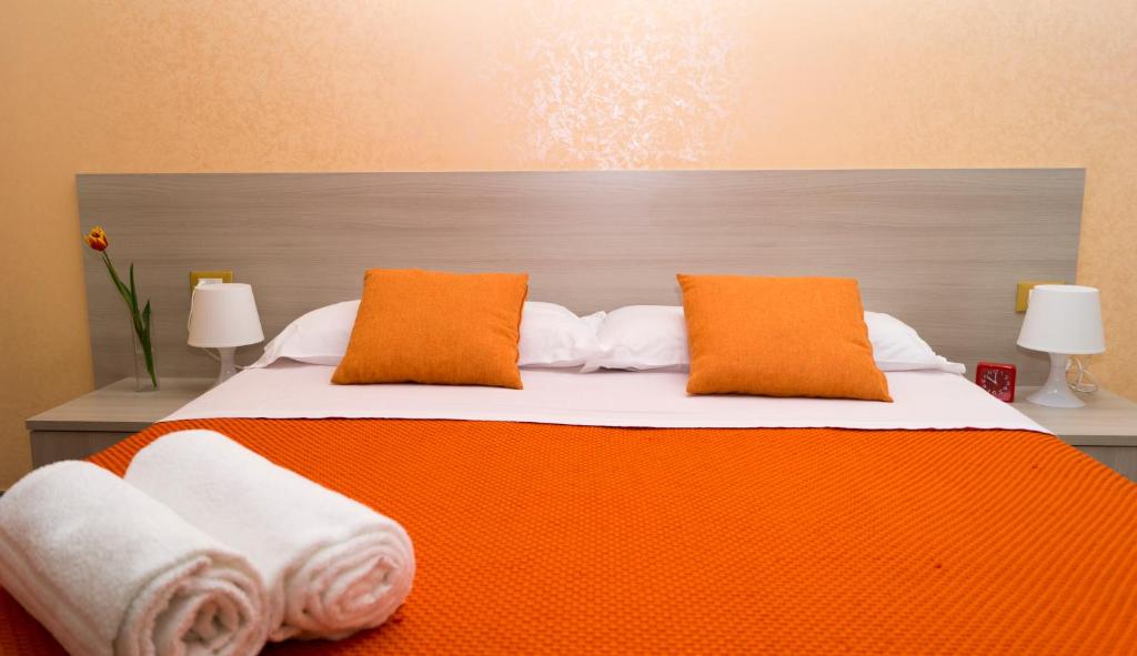 Postel nebo postele na pokoji v ubytování B&B Alta Marea Pozzallo