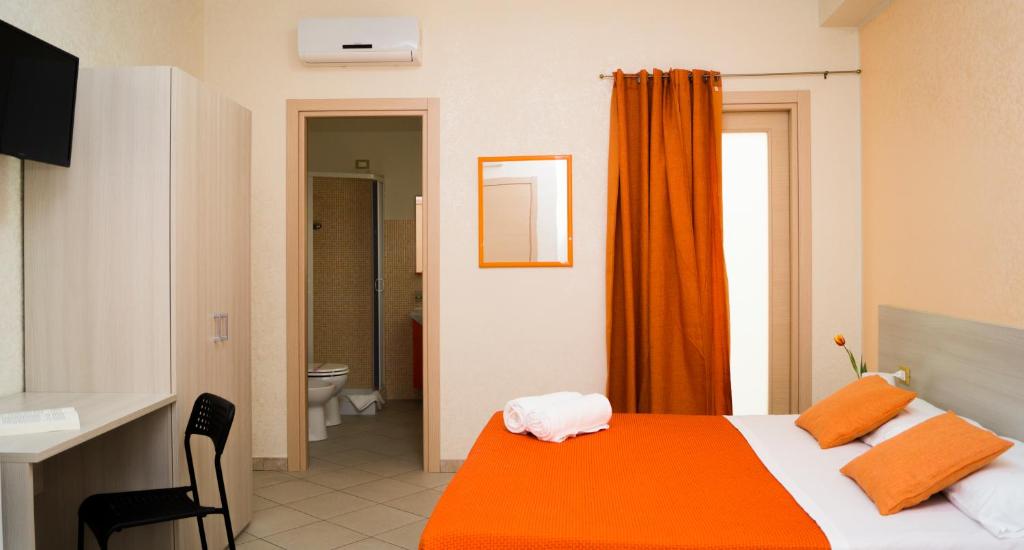 Postel nebo postele na pokoji v ubytování B&B Alta Marea Pozzallo