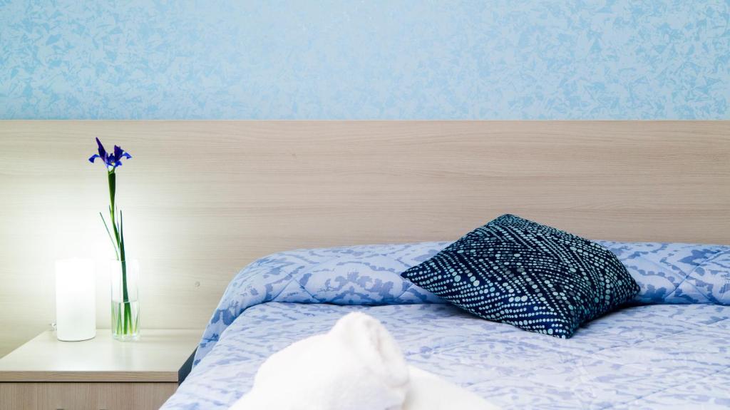 Postel nebo postele na pokoji v ubytování B&B Alta Marea Pozzallo