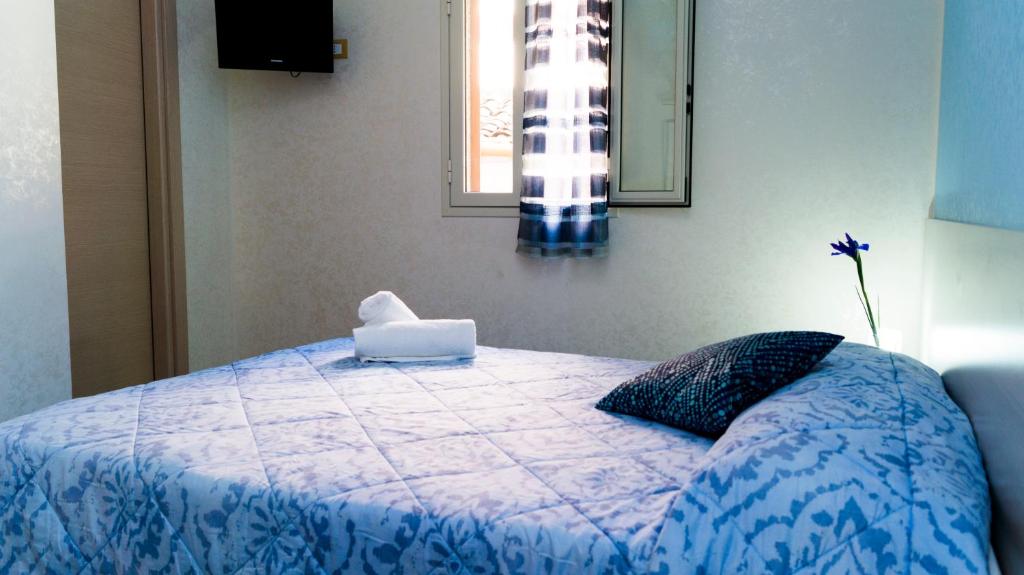 Postel nebo postele na pokoji v ubytování B&B Alta Marea Pozzallo