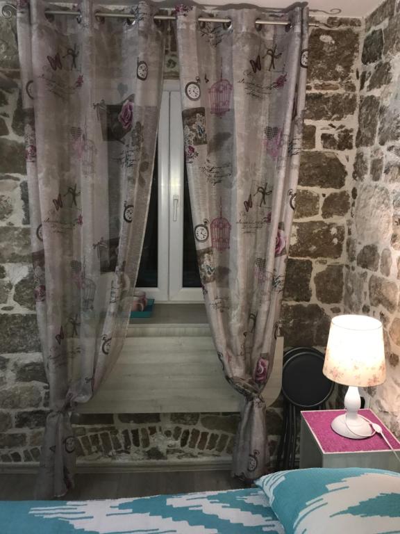 Postel nebo postele na pokoji v ubytování Room N&M - Diocletians palace