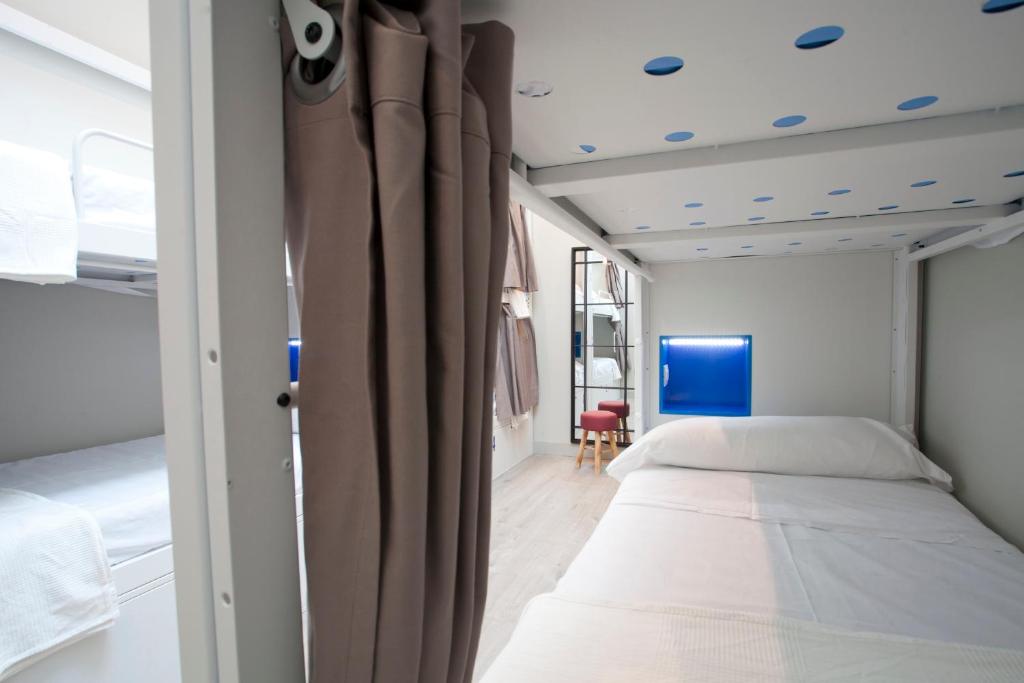Postel nebo postele na pokoji v ubytování Malaga Stop Hostel AB