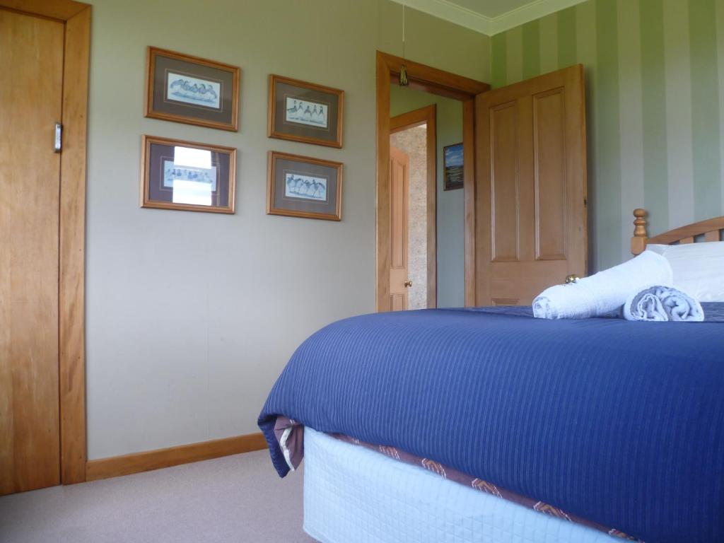 Postel nebo postele na pokoji v ubytování Hilltop Accommodation Catlins