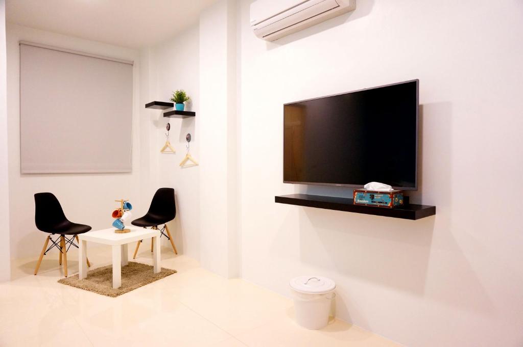 TV a/nebo společenská místnost v ubytování Zhuji Hostel