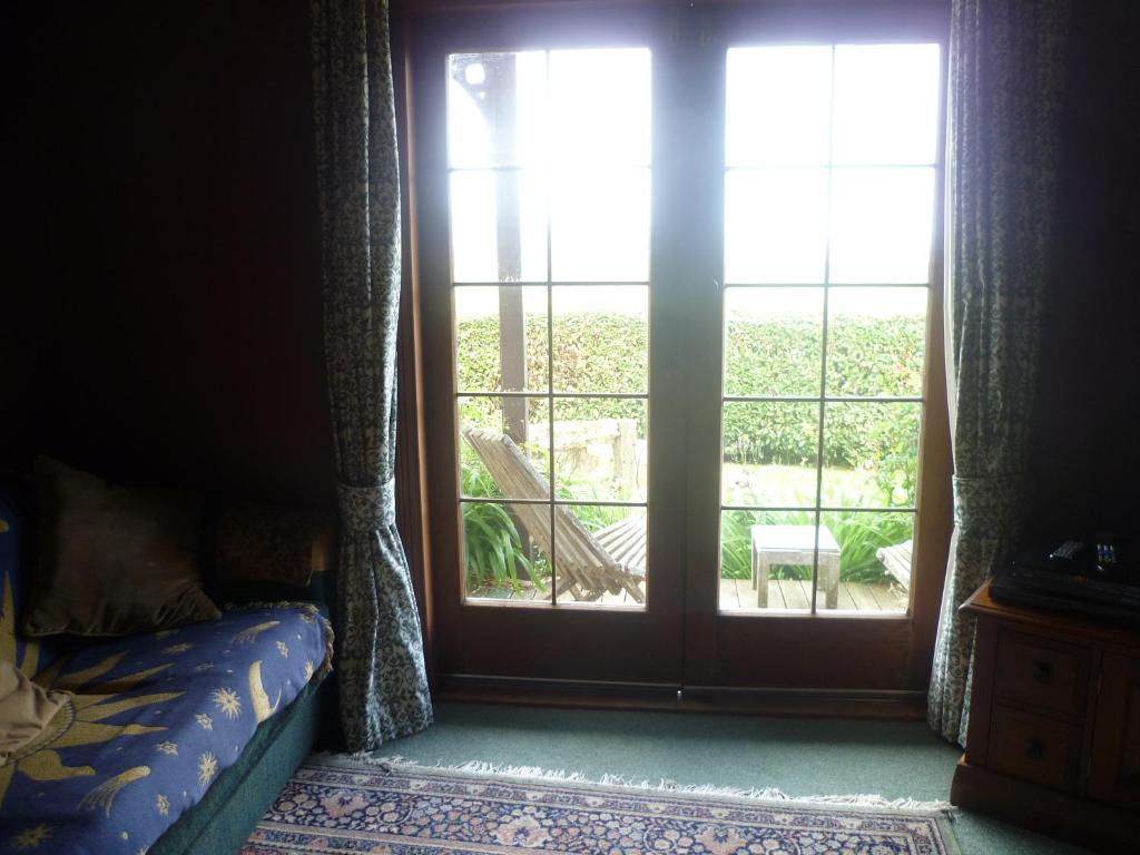 Postel nebo postele na pokoji v ubytování Hilltop Accommodation Catlins