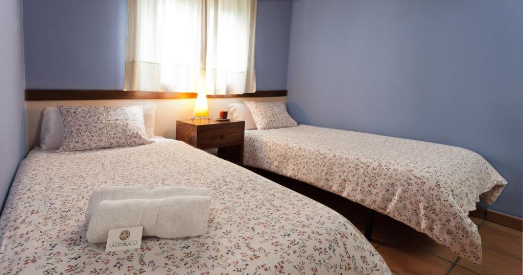 Postel nebo postele na pokoji v ubytování La Estibialla