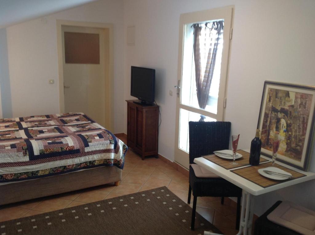 Postel nebo postele na pokoji v ubytování Bed & Breakfast Batosic Makarska
