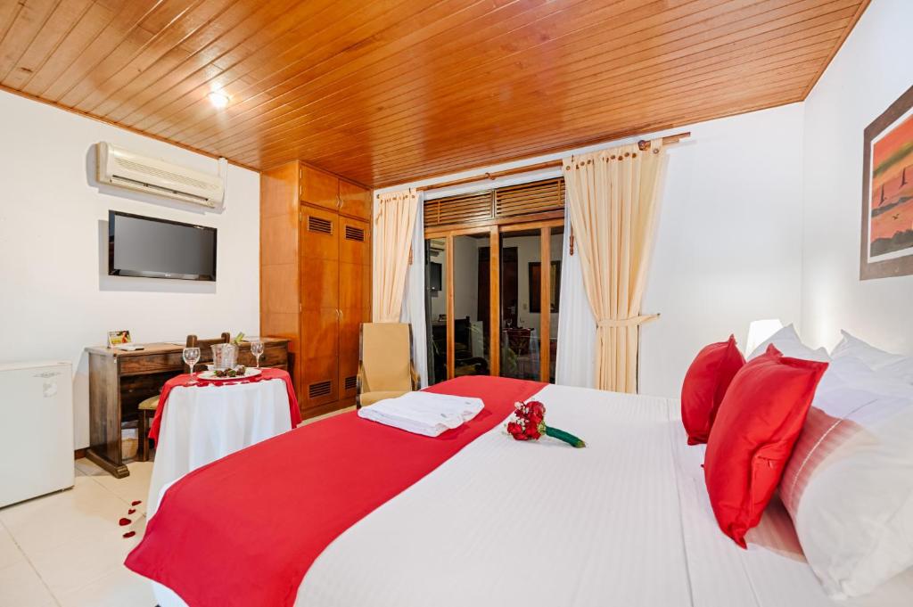 Una cama o camas en una habitación de Hotel Campestre La Potra