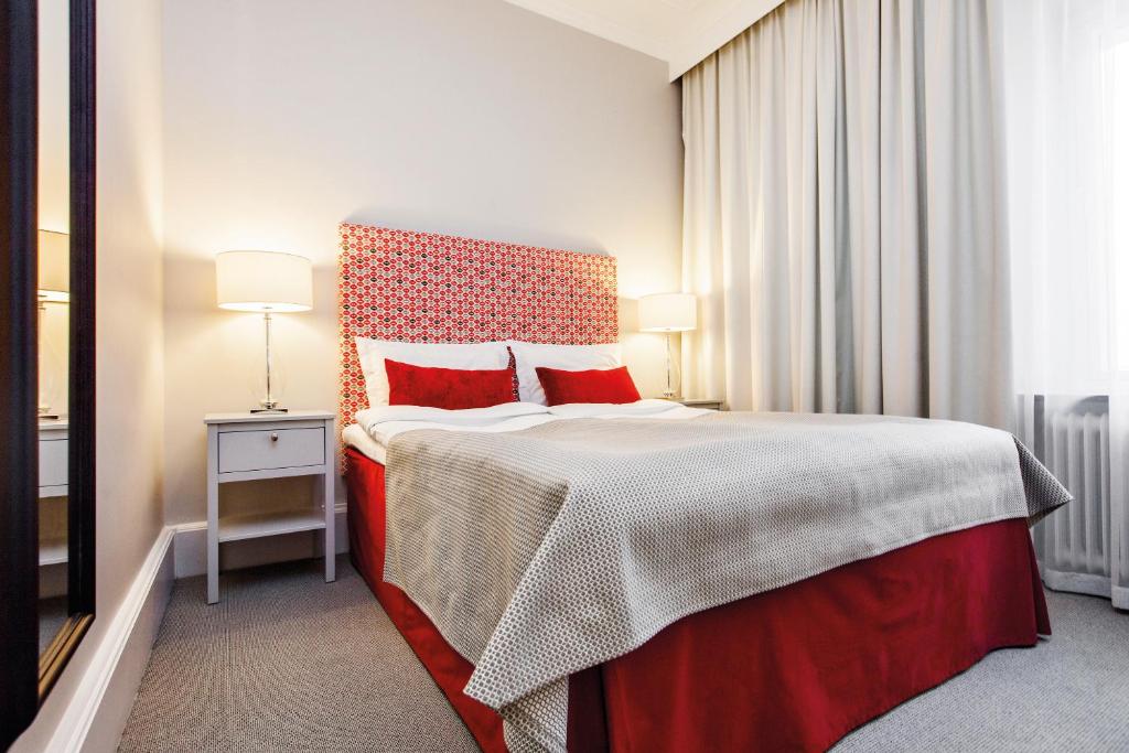 Postel nebo postele na pokoji v ubytování Elite Stadshotellet Luleå