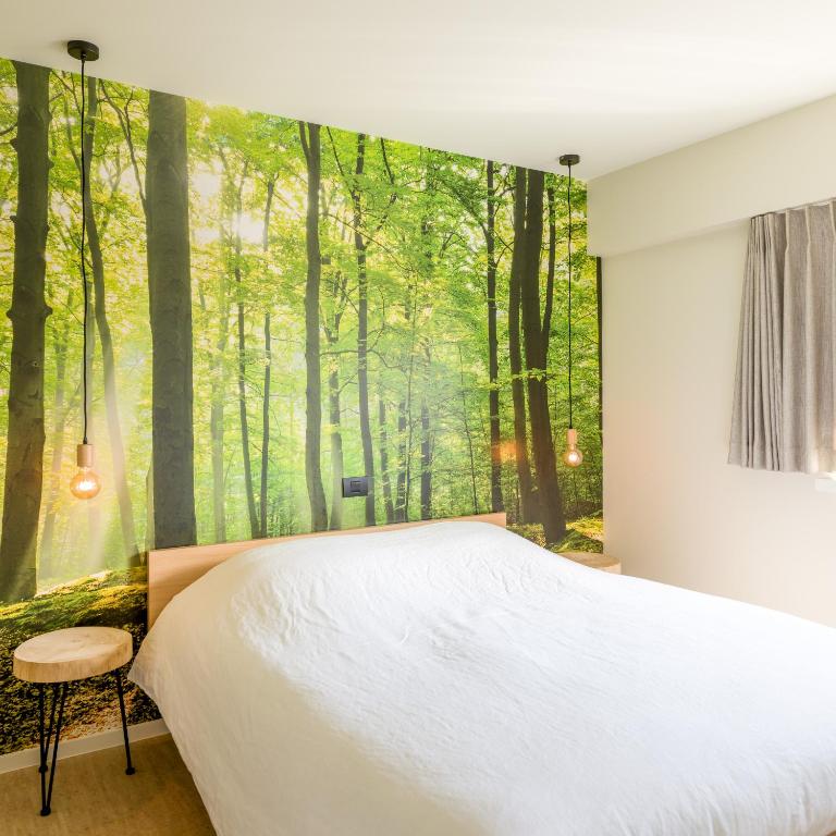 Postel nebo postele na pokoji v ubytování B&B Antares