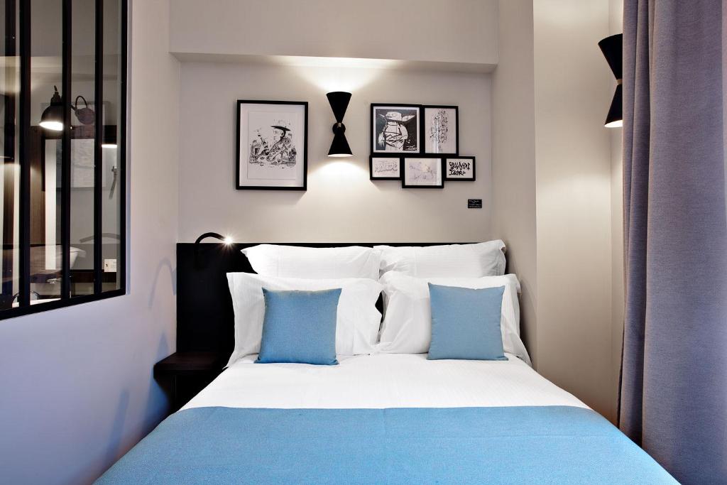 Postel nebo postele na pokoji v ubytování Boutique Hotel Villa du Taur