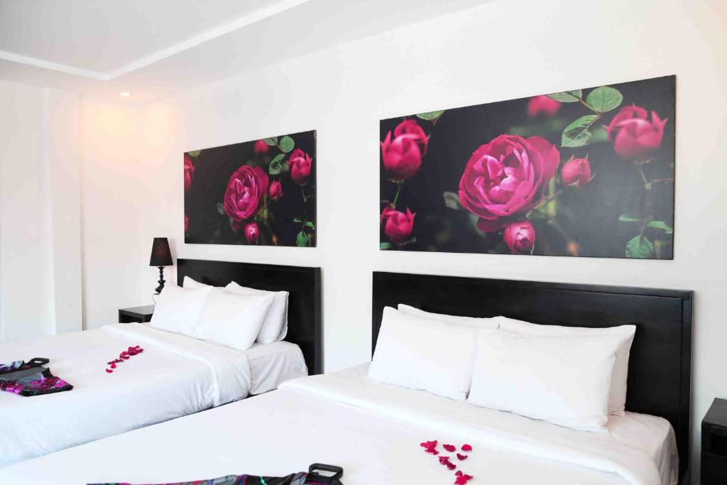 Postel nebo postele na pokoji v ubytování Thanh Binh 2 Hotel