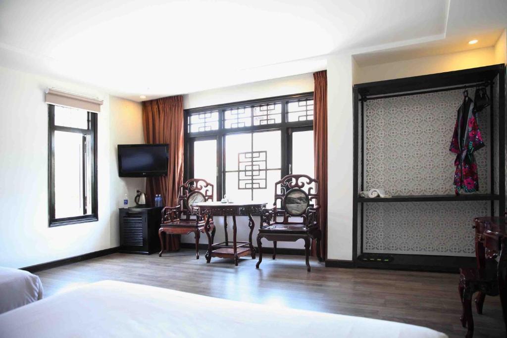 Postel nebo postele na pokoji v ubytování Thanh Binh 2 Hotel