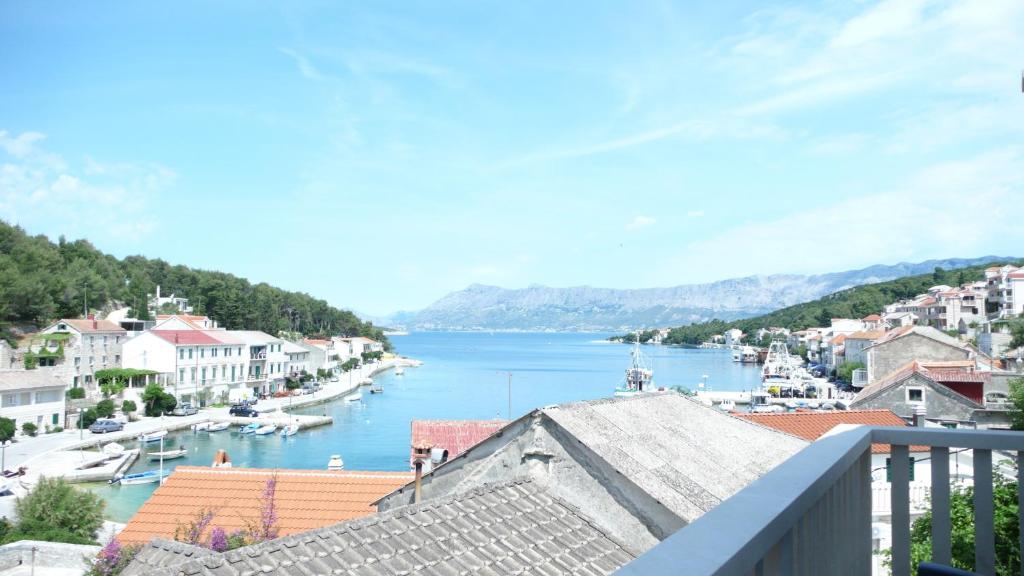 a view of a body of water from a town at Villa Libana in Povlja