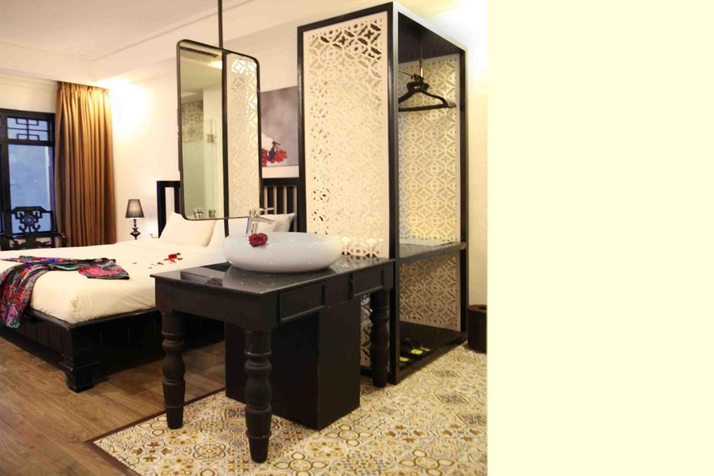 Postel nebo postele na pokoji v ubytování Thanh Binh 2 Hotel
