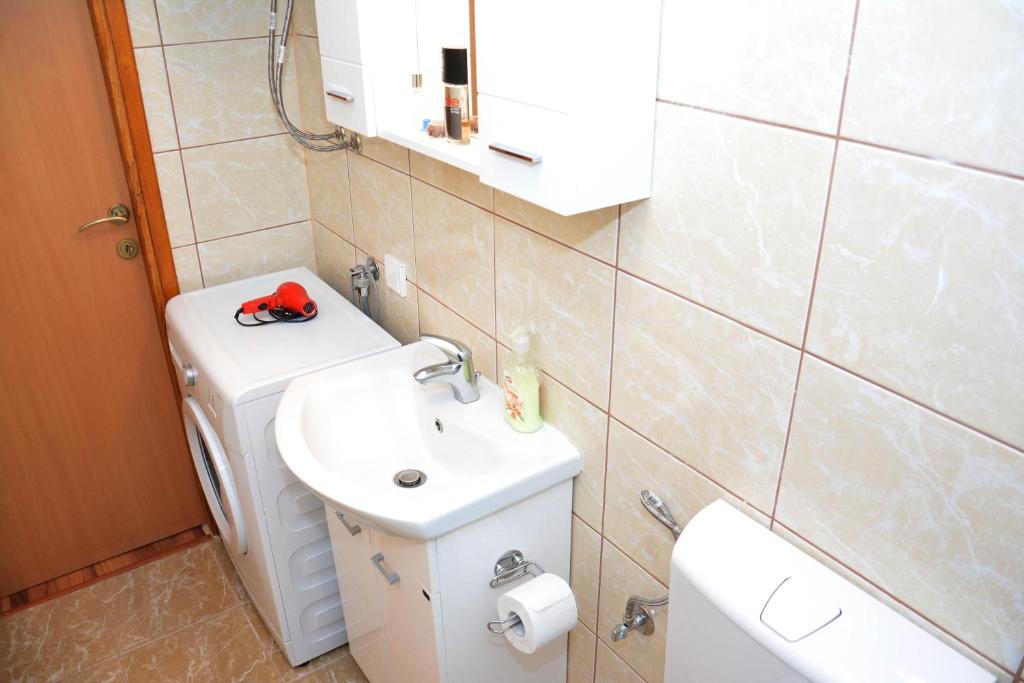 Koupelna v ubytování Apartment Biser