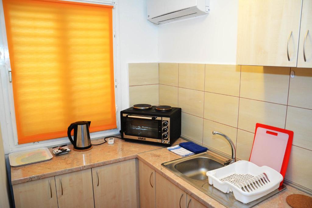 Kuchyň nebo kuchyňský kout v ubytování Apartment Biser