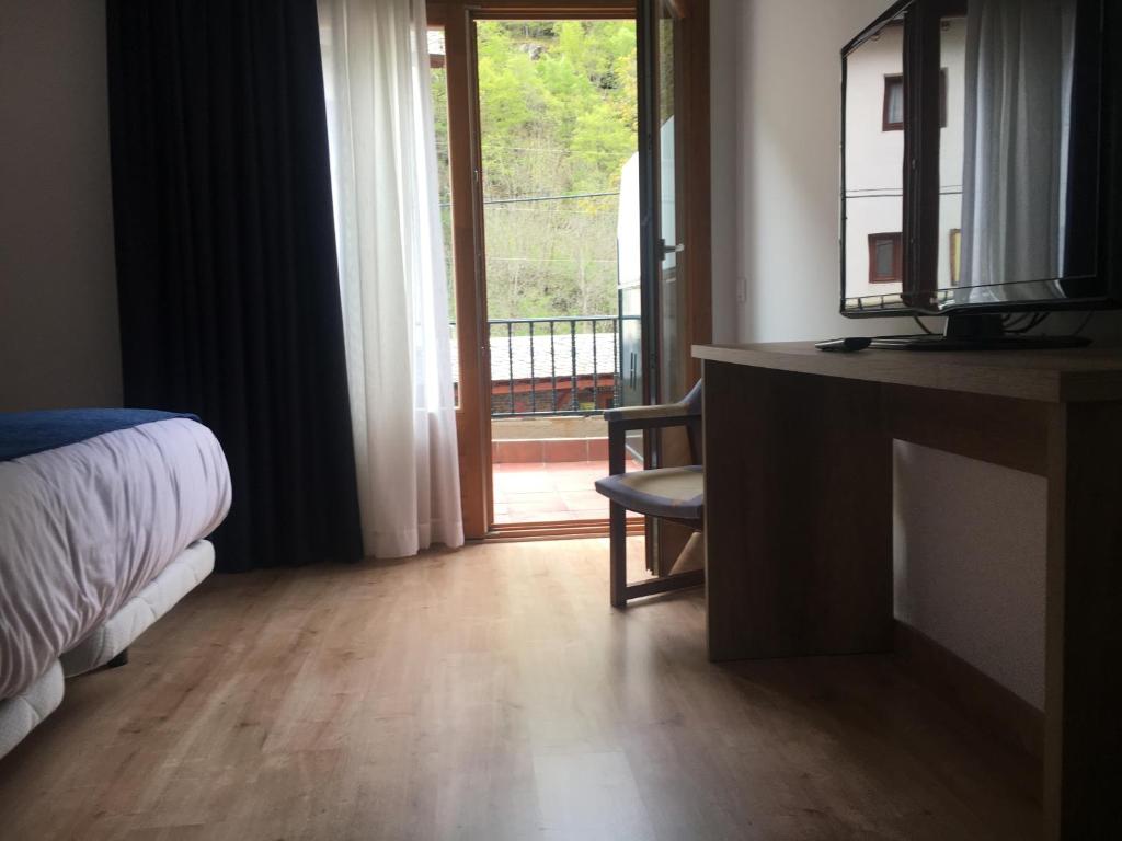 Postel nebo postele na pokoji v ubytování Hotel Marxant