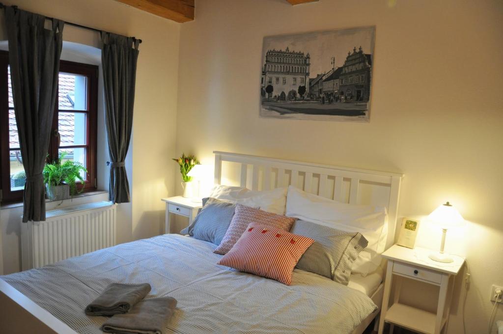 Postel nebo postele na pokoji v ubytování Apartmány U Vavřince