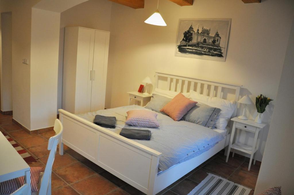 Postel nebo postele na pokoji v ubytování Apartmány U Vavřince