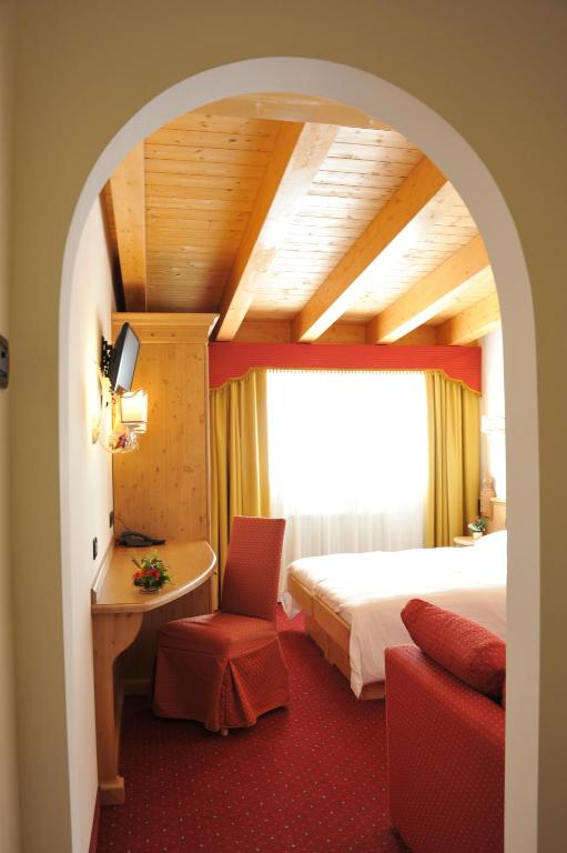 Posteľ alebo postele v izbe v ubytovaní Hotel Negritella