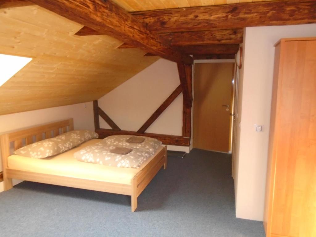 Postel nebo postele na pokoji v ubytování Hostinec Peterka