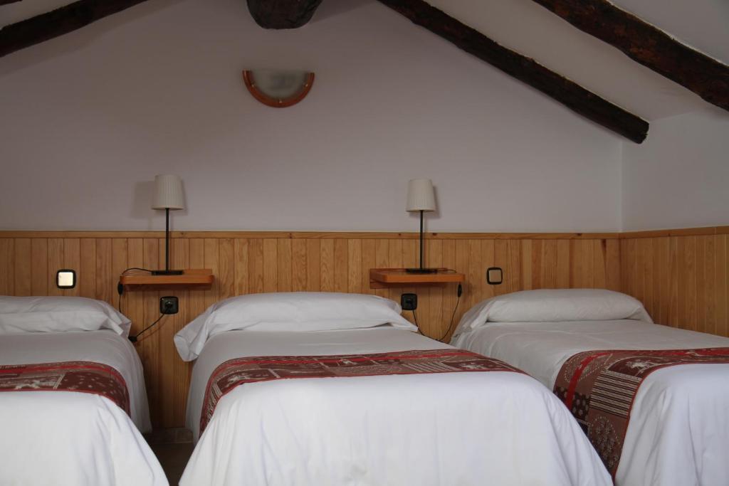Postel nebo postele na pokoji v ubytování Hôtel Bruxelles