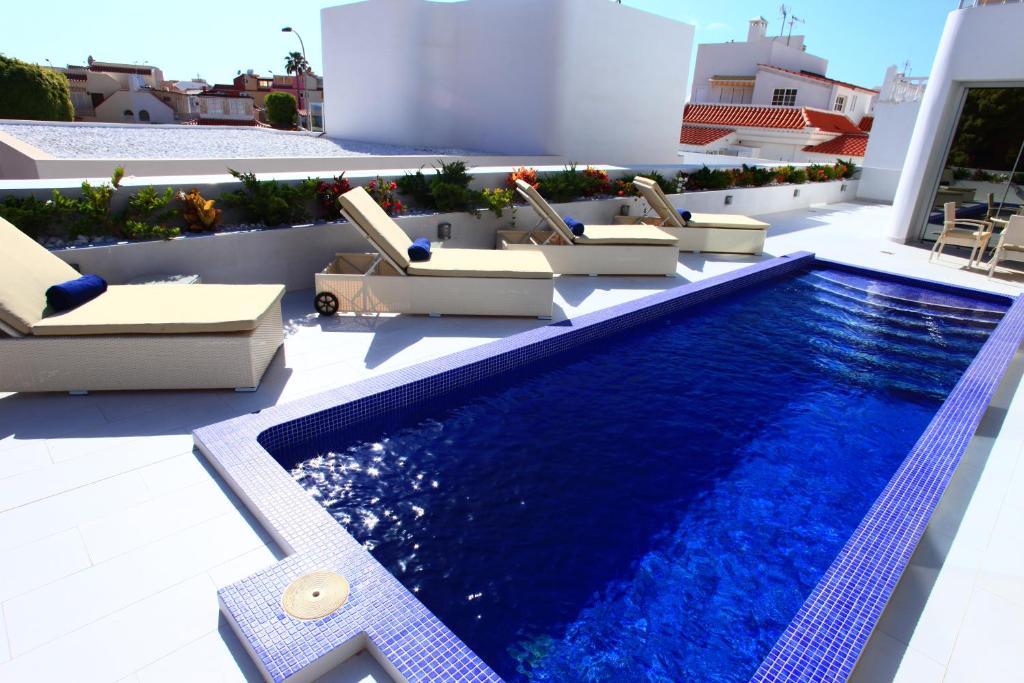 Bazén v ubytování Villas Flamingo Resort nebo v jeho okolí