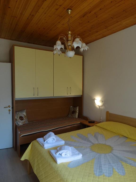 Postel nebo postele na pokoji v ubytování Affittacamere Graziella