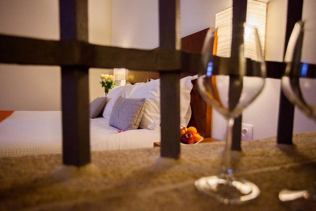 Uma cama ou camas num quarto em Convento Da Serta Hotel