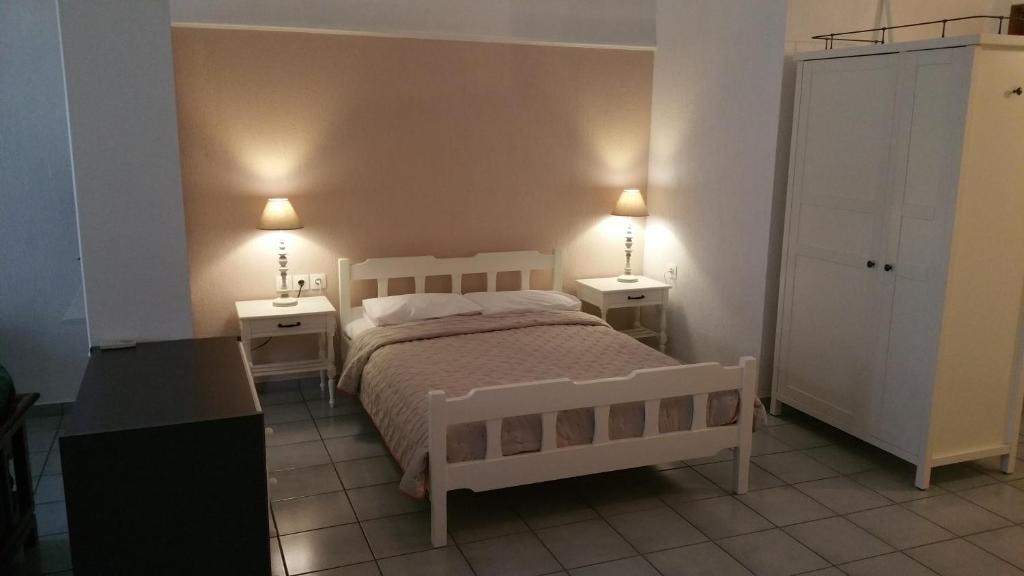 Postel nebo postele na pokoji v ubytování Lina A & M