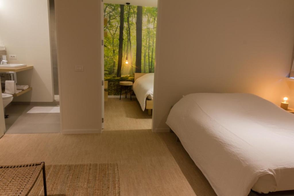 Postel nebo postele na pokoji v ubytování B&B Antares