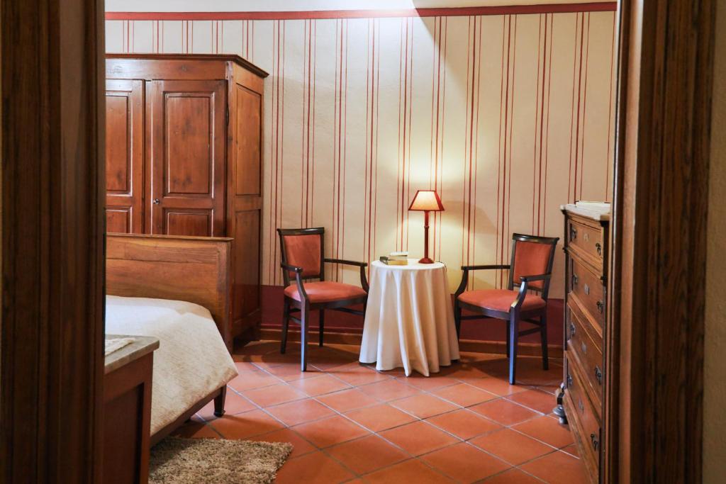 Postel nebo postele na pokoji v ubytování Agriturismo Villa Mazzi