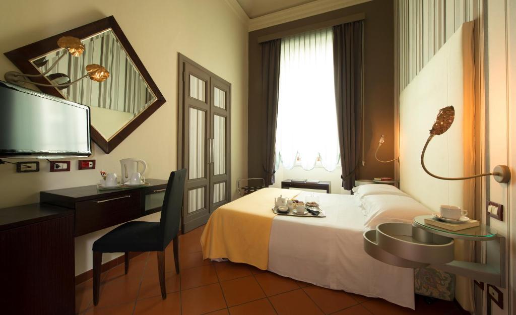Posteľ alebo postele v izbe v ubytovaní Hotel De La Pace, Sure Hotel Collection by Best Western
