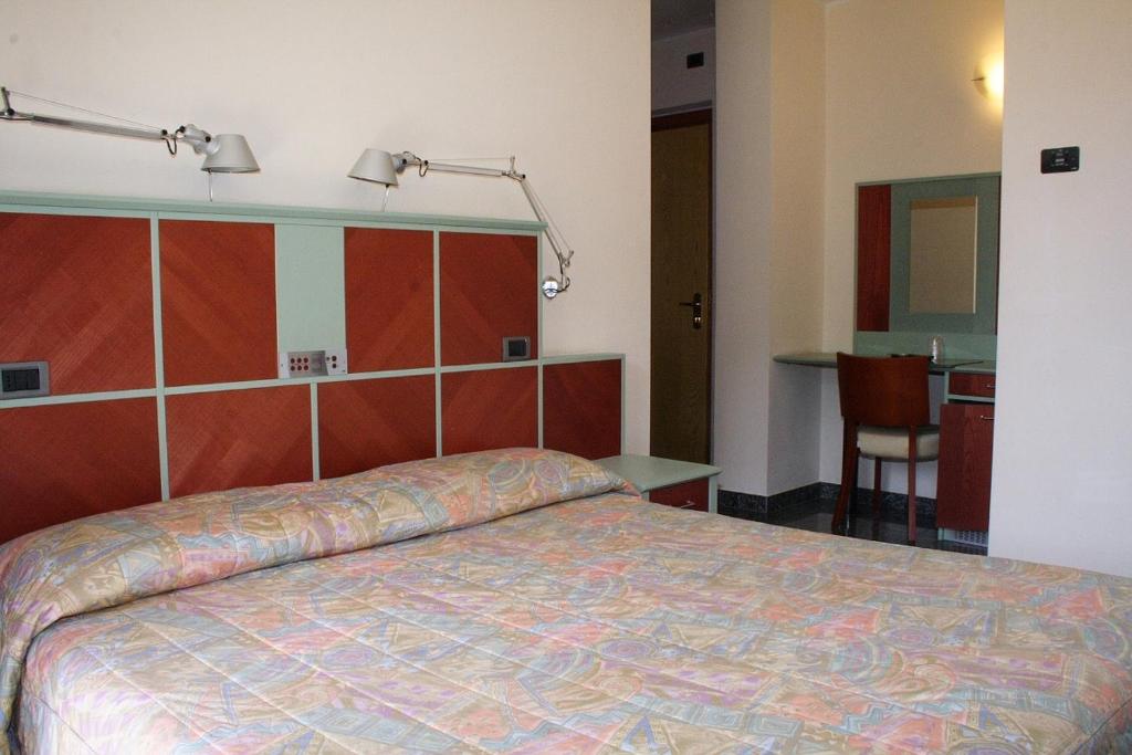 Postel nebo postele na pokoji v ubytování Hotel Derby
