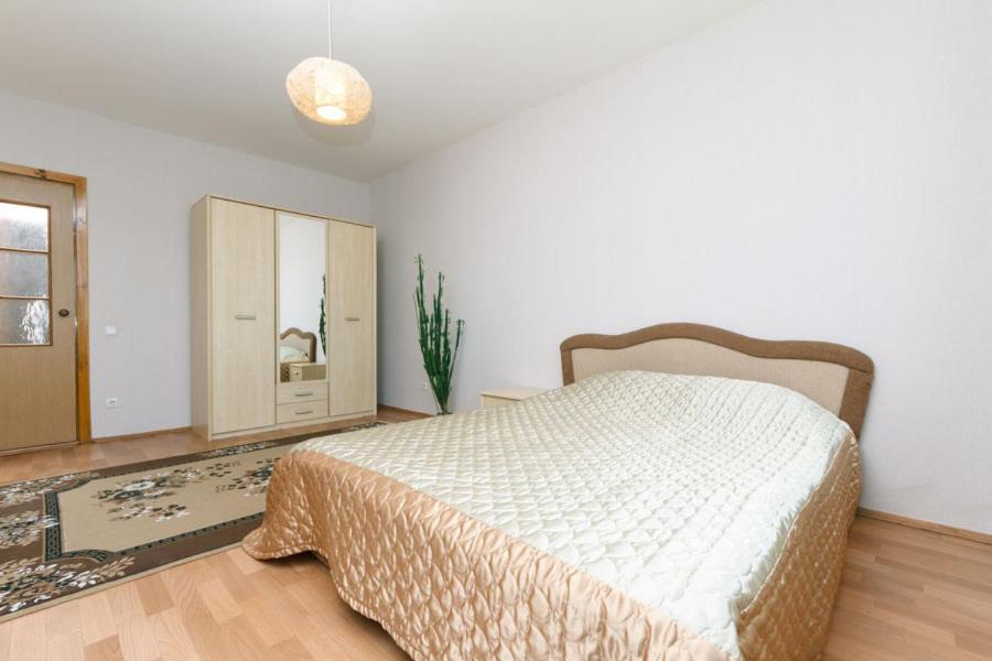 Кровать или кровати в номере Apartment on Grygorenko street